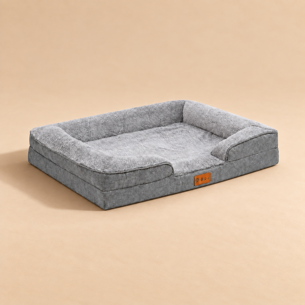 Bolster Dog Bed in Dark Gray with padded edges on three sides and a low front