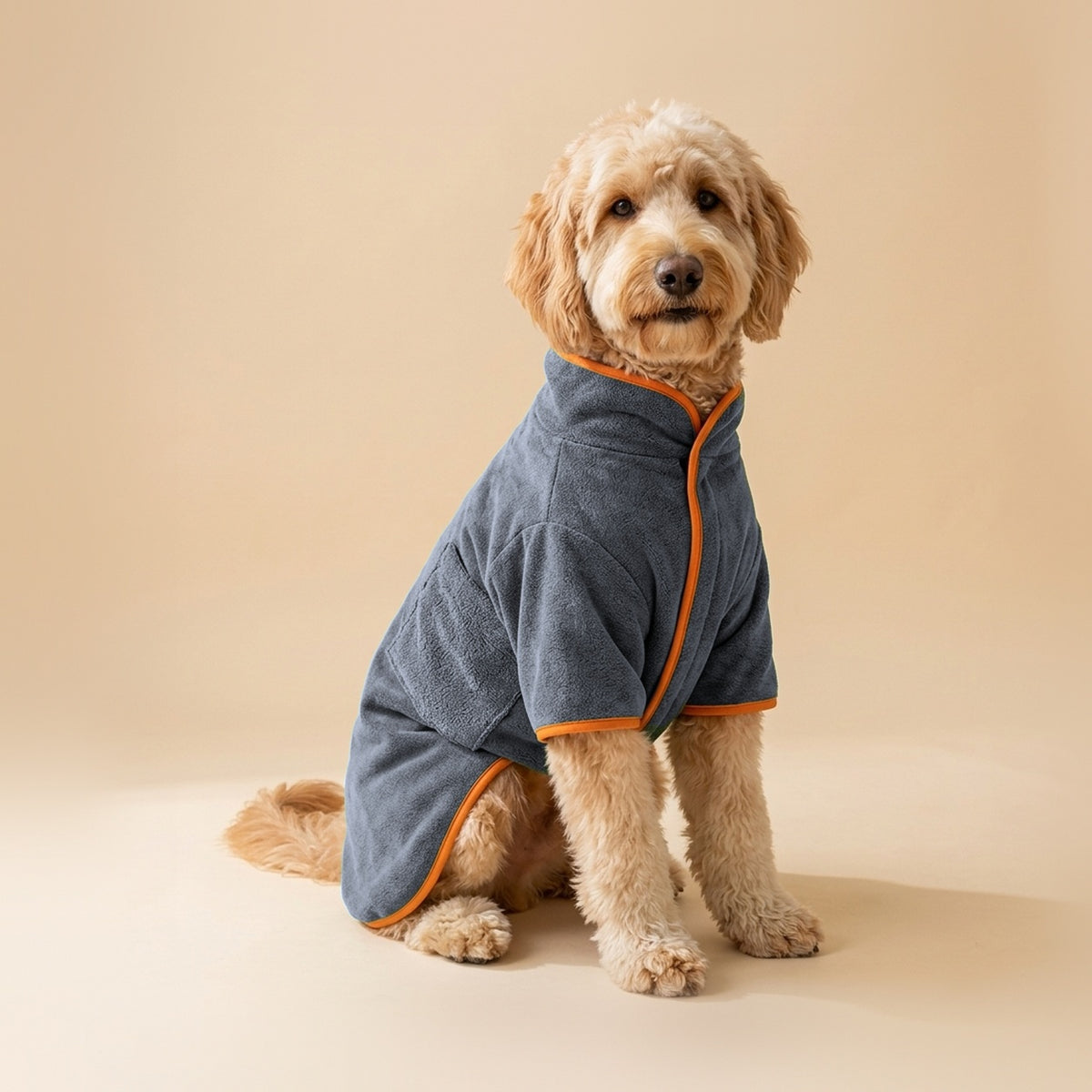 Goldendoodle wearing the Microfiber Drying Robe in Grey with Orange Trim