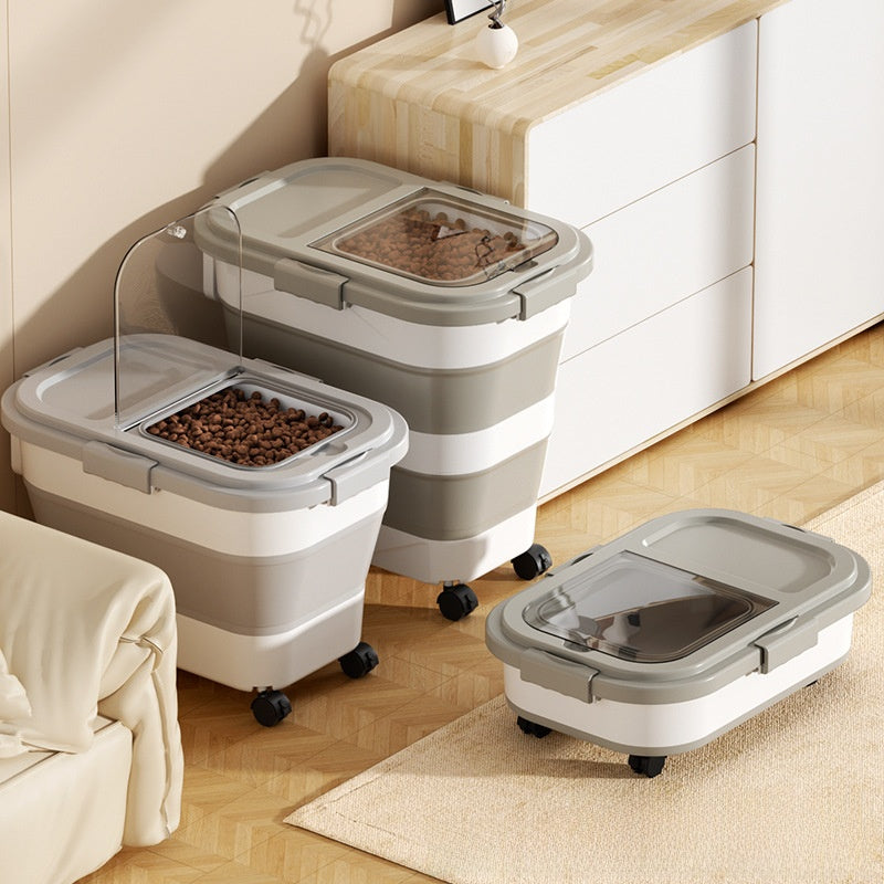 Three gray Collapsible Sealed Dog Food Storage Bins at different heights in a living room, two filled with kibble